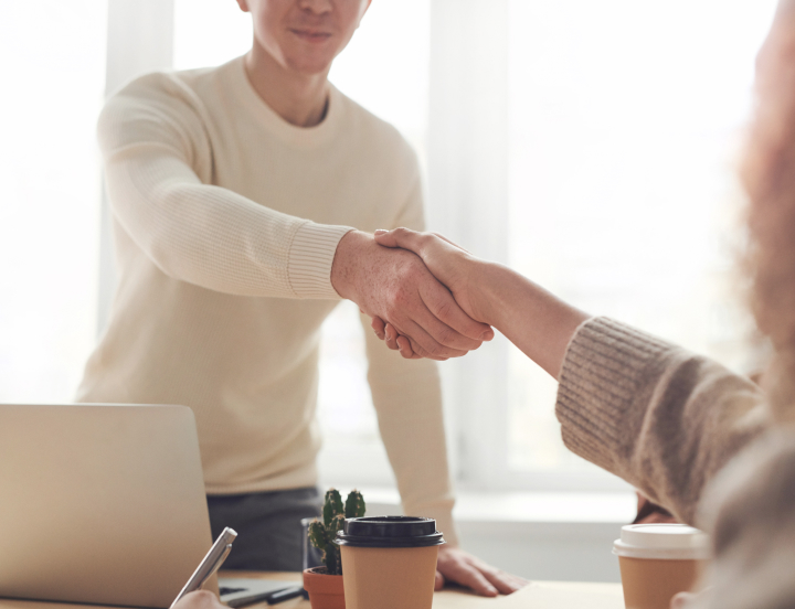 Superior Flight School partner shaking hands