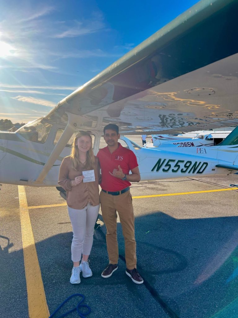 SFS student and instructor next to Cessna 172 N559ND